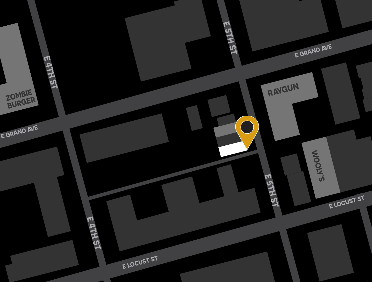 A map of Black Magic Tattoo's location around the East Village shops including Zombie Burger, Raygun, and Wooly's